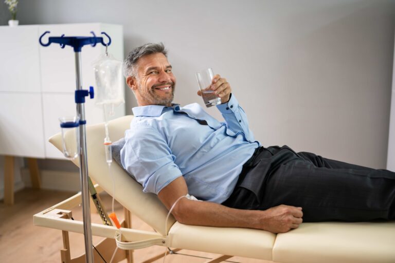 Man having a iv infusion while relaxing